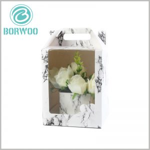 Paper Gable box with windows for flower packaging. The marble design pattern makes the flower packaging unique and attractive, which is very helpful for product promotion.