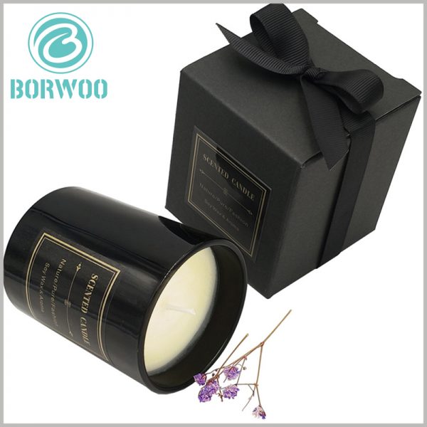 black cardboard candle gift boxes wholesale. The top of the black cardboard boxes uses silk as decorative gift bows to better reflect the value of candle gifts.