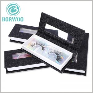 black cardboard eyelash box packaging with window.There is laser paper as decoration under the transparent blister, and the inside of the package has different colors and reflections from different angles.