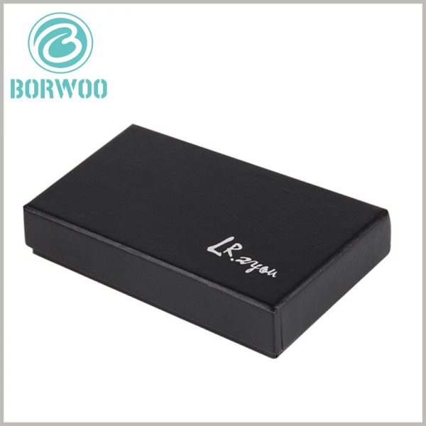 black cardboard packaging box with logo. Customized small black cardboard boxes are used for tie packaging, and the cover is printed with the brand name to highlight the brand value.
