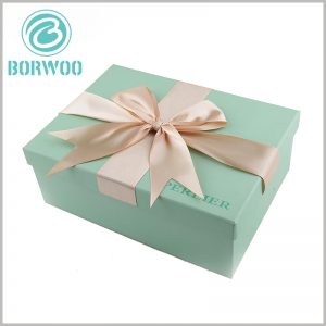 blue small cardboard gift boxes with lids.The blue art paper improves the fashion of packaging and adds more attractiveness and charm to gifts.