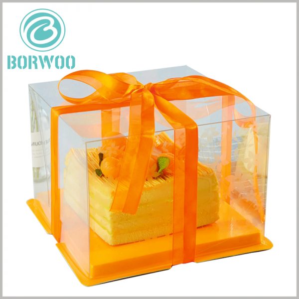 clear cake boxes with orange ribbon. The theme of the cake packaging is to use clear PET as the material, so that the packaging has a high degree of visibility and enhance the appeal of cake food.