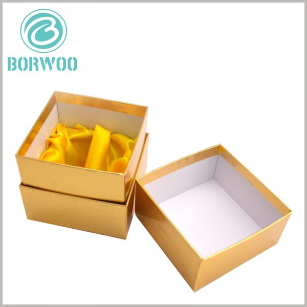 custom gold cardboard boxes for candles packaging. Square cardboard boxes with lids, the necks of custom cardboard boxes also use gold cardboard as laminated paper