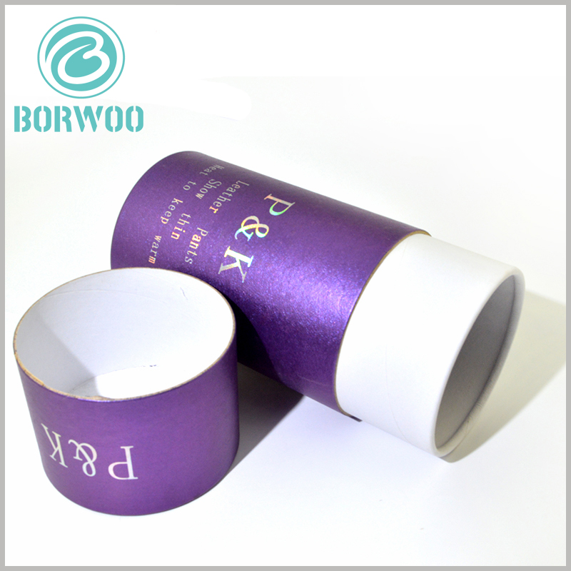 custom purple cardboard round boxes for leather pants packaging. The cardboard cylinder packaging uses 350gsm cardboard as the raw material, and the top edge of the inner tube has a smooth curling edge.