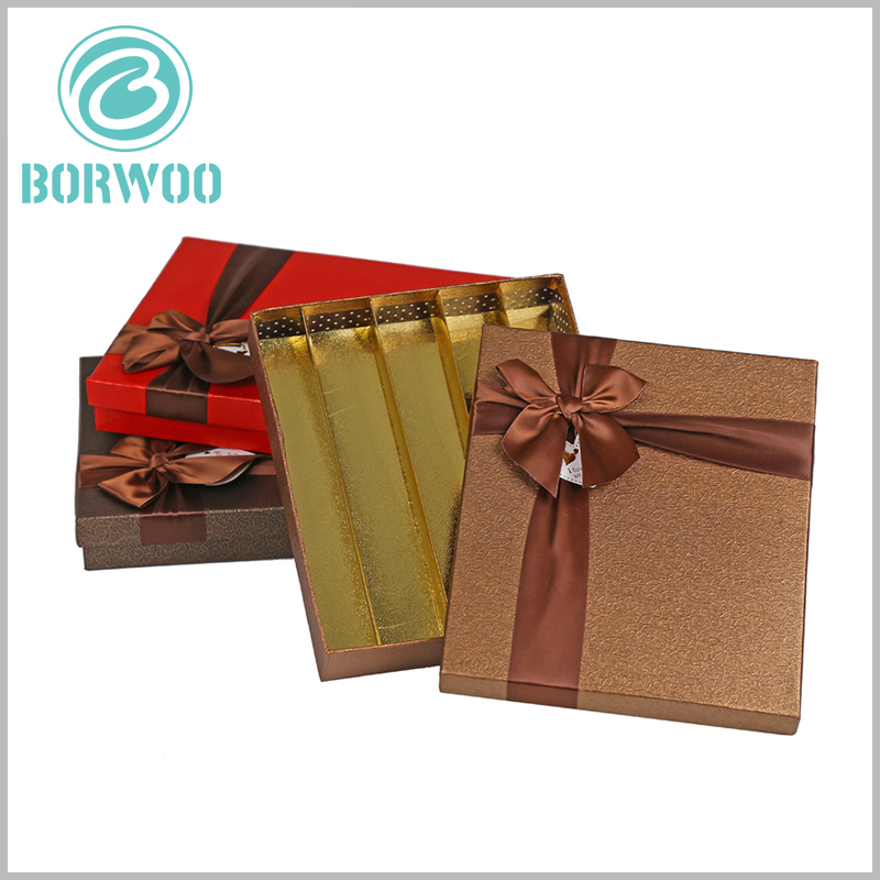 large gift boxes with ribbon for 30 chocolates packaging. Gold cardboard is used as an internal insert in the package, which can divide the internal space of the package and play a decorative role.