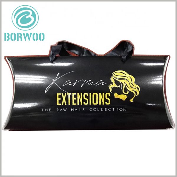 Black pillow boxes for hair extensions packaging. Through the printed content on the black packaging box, you can easily determine the type of product inside the packaging.