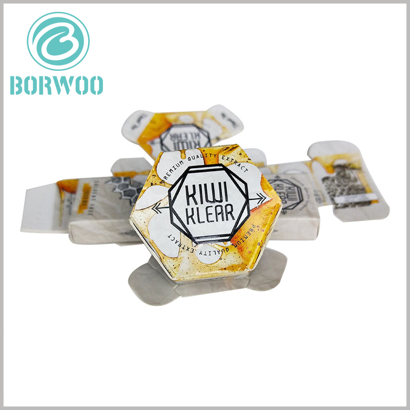 Creative hexagonal boxes for food packaging. The brand name and promotional slogan are printed with emboss, and the customized packaging has a letterpress visual sense.