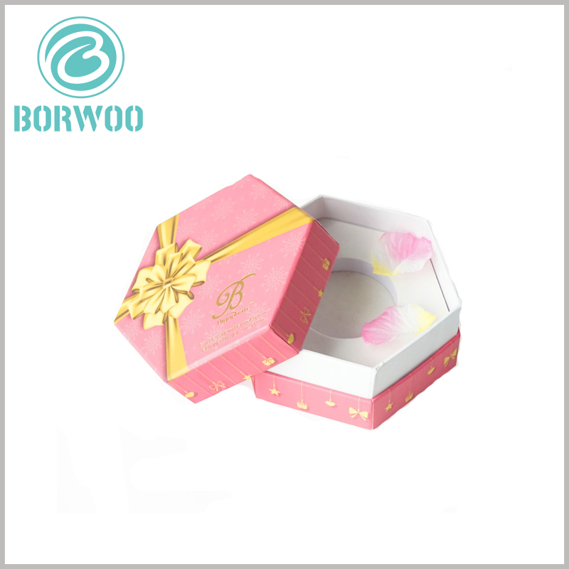 Hexagonal packaging for perfume bottle. The thick white EVA is used as an insert inside the perfume gift boxes to fix the perfume glass bottle to avoid shaking and damage.