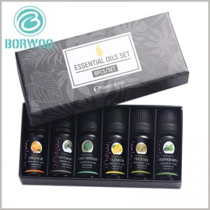 black Essential oil packaging for lot of 6 bottles. There is a folded cardboard inside the essential oil boxes as an insert to separate the essential oil bottles to avoid direct contact between the essential oils.