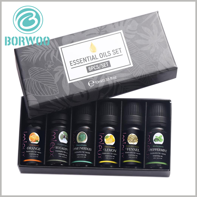 black Essential oil packaging for lot of 6 bottles. There is a folded cardboard inside the essential oil boxes as an insert to separate the essential oil bottles to avoid direct contact between the essential oils.