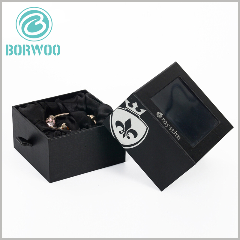 black bracelets gift packaging boxes with windows. The outer box laminated paper of the black product packaging box is different from the inner box laminated paper, and also has a different visual experience.