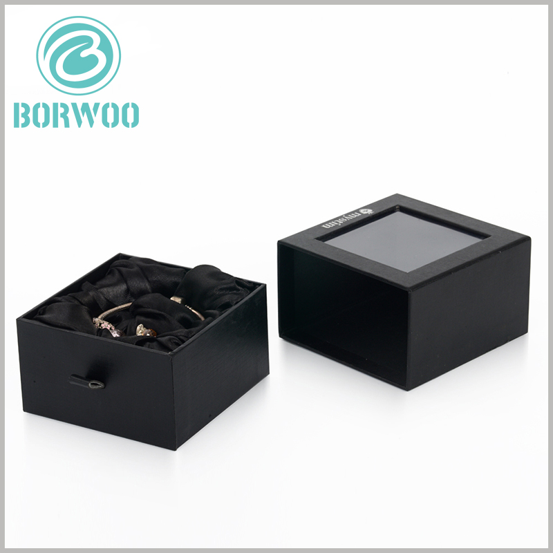 black square bracelets gift boxes with windows. The black silk scarf pull ring on the side of the inner boxes of the cardboard drawer can help the inner box to slide easily.