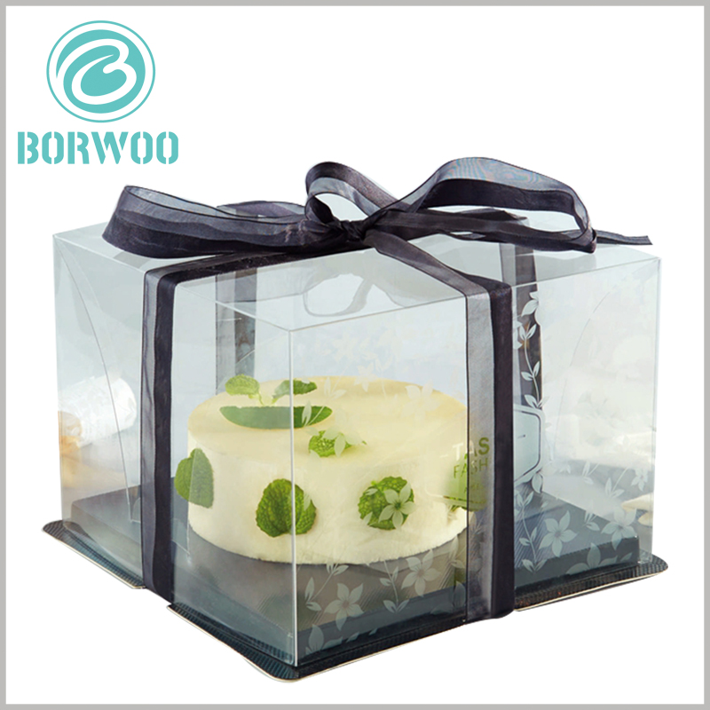 clear cake boxes with black ribbon. The black cardboard tray can bear heavier weight compared to the PET tray.