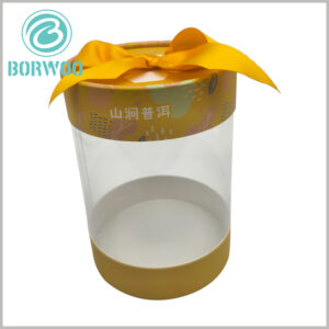 clear cylinder tube packaging with paper lid and gift bow, chocolate, toys, cosmetics, etc. can be placed inside the cylinder packaging for display