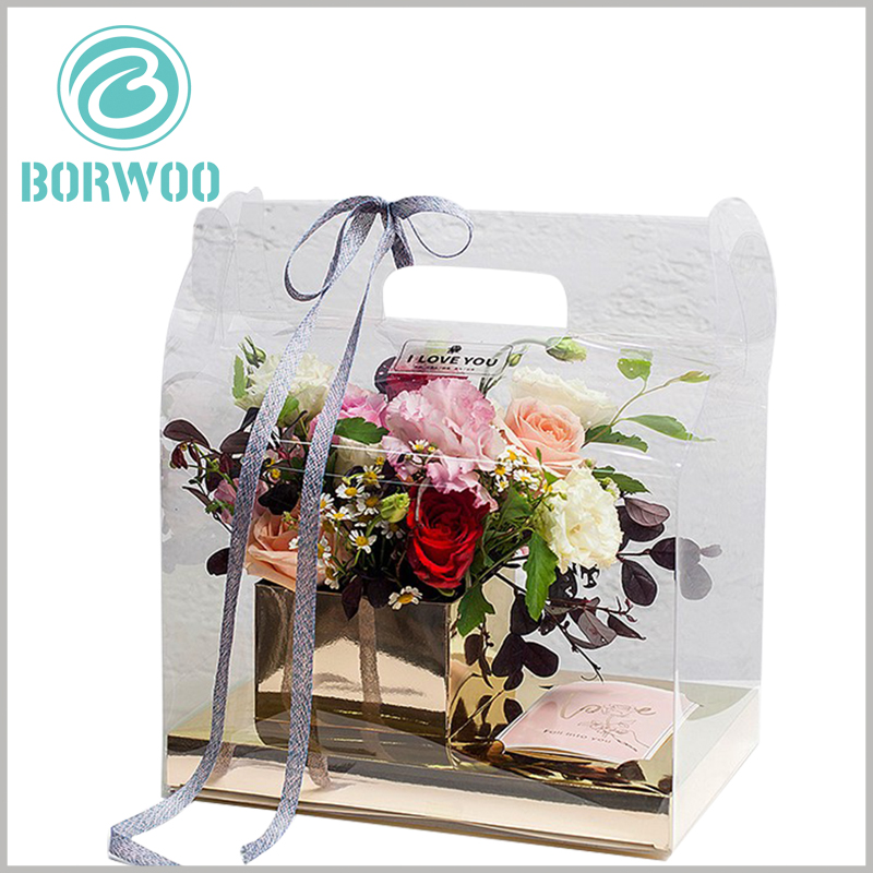 clear plastic gable boxes for flower. The bottom of the inner support of the flower package is made of gold cardboard, which makes the inside of the package look high-end and luxurious.