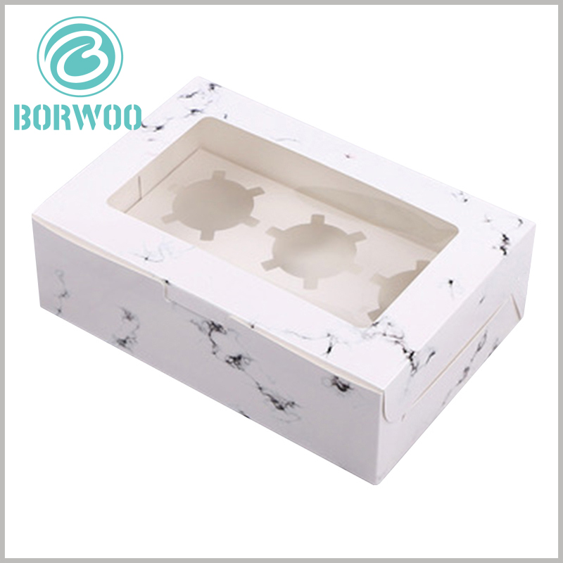 custom Creative mini cupcake boxes with “white marbled road”. The top of the package is made of transparent PVC as the window to satisfy customers' desire to peek into the products inside the package.