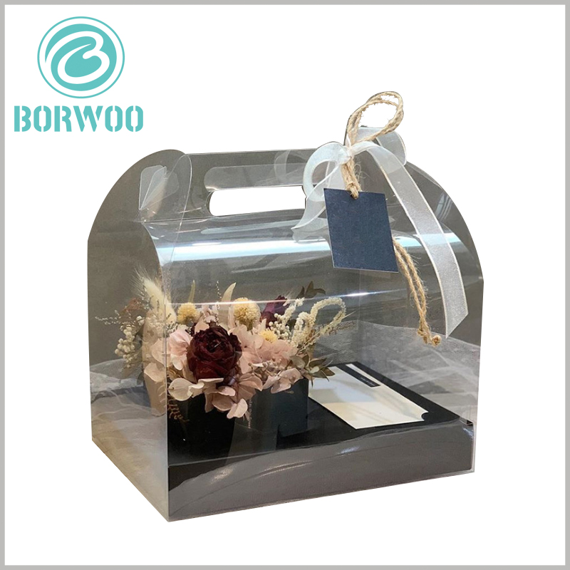 custom clear plastic gable boxes for flower packaging. The top of the flower packaging is decorated with silk or hemp rope, which can increase the beauty of gift boxes.