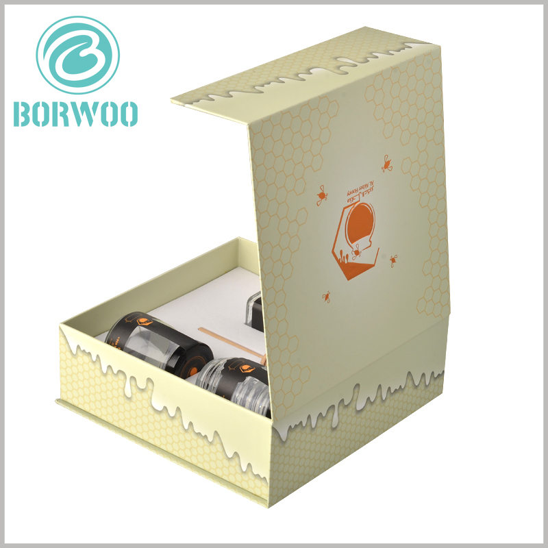 custom creative food packaging for honey. The side of the food packaging has a design similar to "honey liquid", which can bring visual enjoyment to customers and increase the attractiveness of the product to customers.