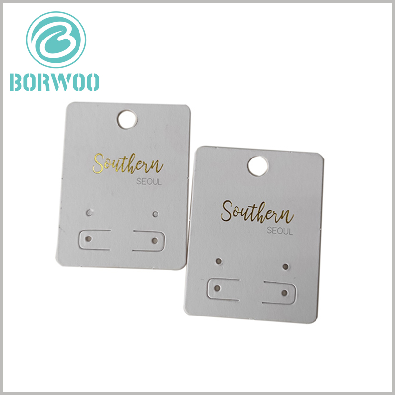 custom white paper hang tag for jewelry. Jewelry hang tags use a combination of bronzing printing and spot color printing, the main purpose is to create and promote the brand.