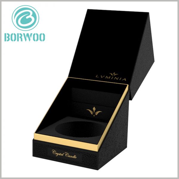 high-end black candle packaging boxes with insert. The brand name and logo of the candle are printed by bronzing, and the golden fonts, patterns, and the black background form a sharp contrast.