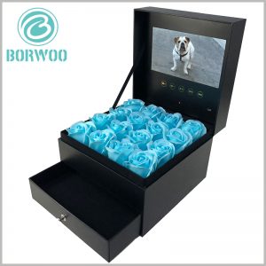 large flower packaging boxes with video screens. The flower packaging box with drawer, and the inner box of the drawer can be filled with gifts such as food, jewelry, and small accessories.
