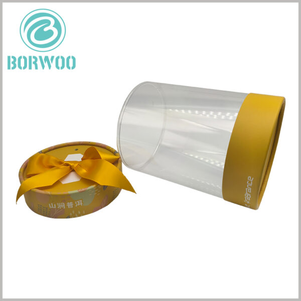 Printed clear cylinder tube packaging with paper lid and gift bow, provide specific printing content according to different product requirements.