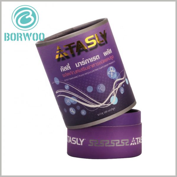 purple cardboard tube for 100 capsules boxes. With the help of the printed content of the base of the cylindrical packaging boxes, basic information such as product capacity can be easily judged.