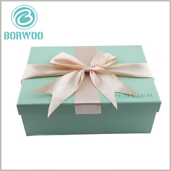 small cardboard gift boxes with lids wholesale. Customized packaging uses gift bows as decoration, which increases the value of the product and makes the gift recipients feel valued.